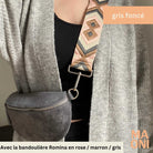 sac banane en daim petit gris foncé porté avec la bandoulière Romina en rose / marron  / gris